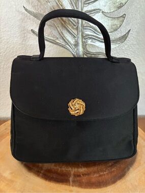 Vintage Bienen Davis Black Satin Top-Handle Satchel with Gold Knot Accent.